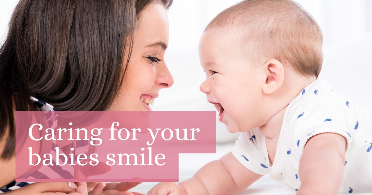 mother smiling at baby